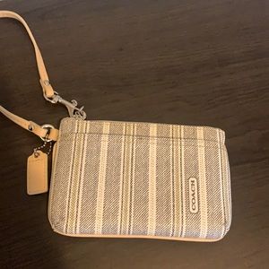 Stitched coach wristlet